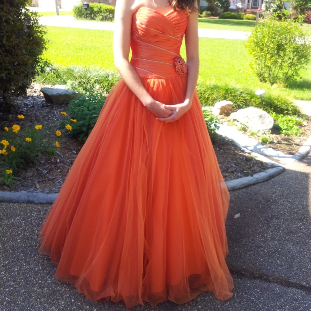 Strapless orange prom dress